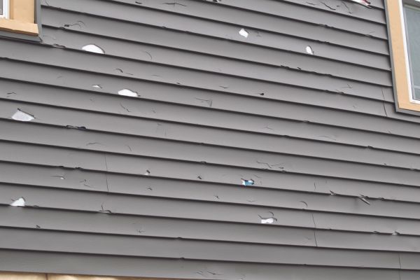 Damaged Siding Replacement in Spring