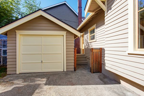 Garage Siding Replacement in Spring