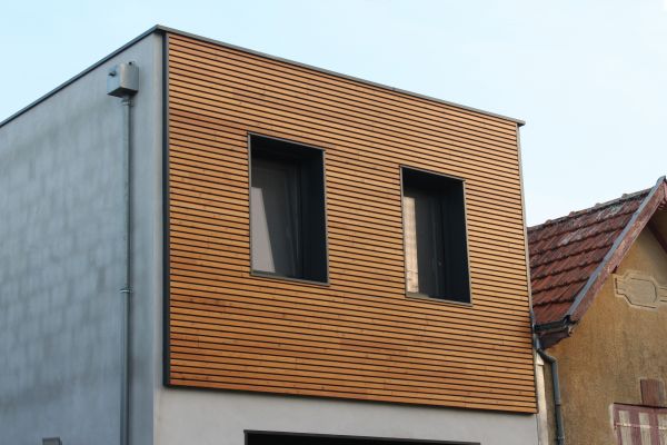 Treated Wood Siding Repair in Spring