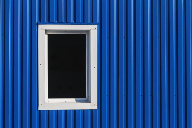 Blue Siding Installation