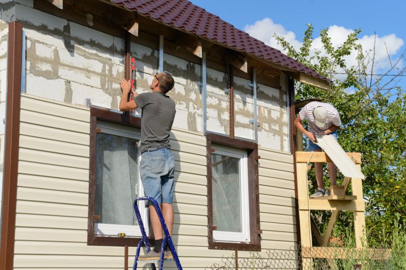 Expert Installing Replacement Siding